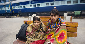Treinreizigers  op station New Delhi.